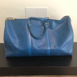 Authentic Louis Vuitton Keepall 55 Epi Leather.